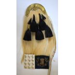 White horsehair sporran set with five black horsehair 'tassels' mounted with figural and thistle