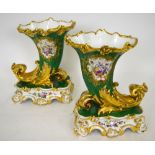 A pair of Chantilly France porcelain ornate cornucopia vases in high rococo style, each painted with