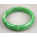 A Chinese green hardstone bangle, D shaped, inside dia. approximately 7 cm, width approx. 110mm