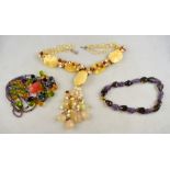 Three ornate natural stone and river pearl and glass bead necklaces