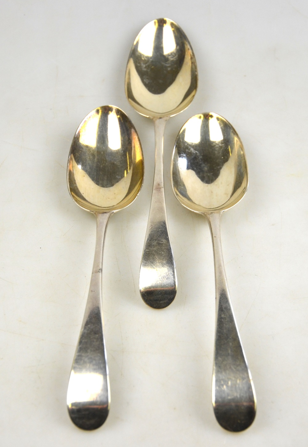 Three George III silver OEP table spoons, John McFerlan, London 1784 (incuse duty mark), 5.9 oz (
