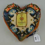 A WW1 period sweetheart pin cushion in the form of a heart, centred with a 29/31 Foot Worcestershire