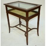 An Edwardian walnut vitrine table, the h