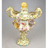 A 19th century Rockingham style rococo revival twin handle pot pourri vase and cover, painted with