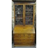 A George III mahogany bureau bookcase ha