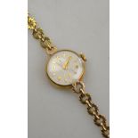 A lady's gold Tudor Royal wristwatch, the 16mm champagne dial with gilt chapters and batons and