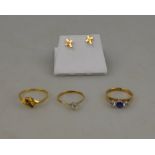 A 9ct gold dress ring set with blue and