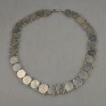 A necklace formed of thirty groat pieces