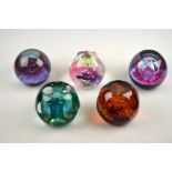 Five Caithness glass paperweights including Aladdin, all limited edition and three with facetted