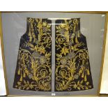 A pair of black shaped silk panels from an Ottoman wedding dress, heavily worked in gold and