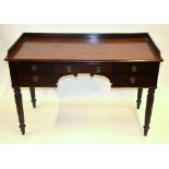 A Victorian mahogany side table, the thr