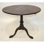 A George III mahogany tripod table, the