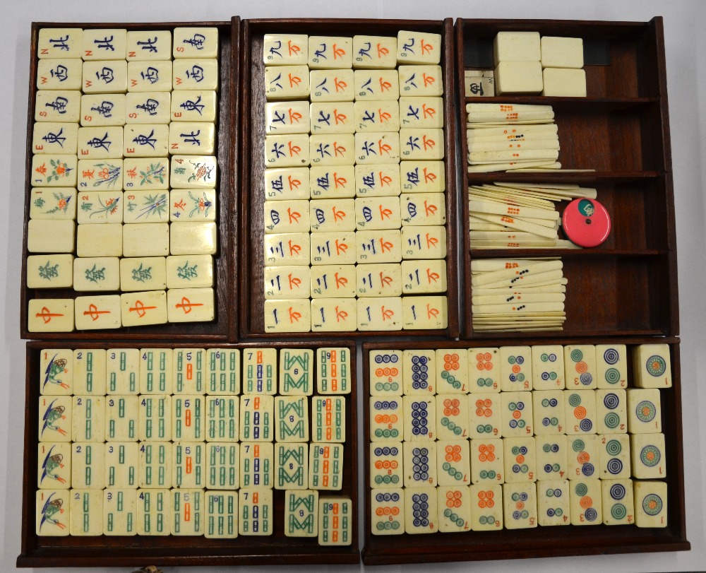 A Chinese Mah Jong set, the hardwood box sliding open to reveal five drawers containing bamboo and - Image 3 of 4