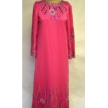 1970's deep pink evening dress embellished to bodice, sleeves and hem with beads and sequins by