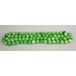 Long row of seventy-two uniform jadeite