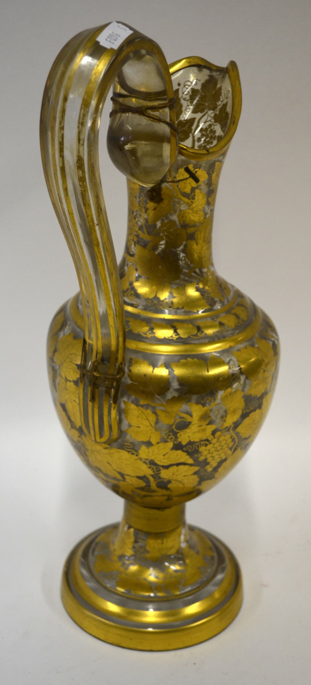 A 19th century continental glass wine ewer ornately decorated with fruit and vine, 40 cm h. - Image 3 of 4