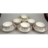 A small collection of 18th century English porcelain tea bowls and saucers comprising four bowls and