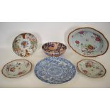 A Chinese porcelain 18th century famille rose quatrefoil oval dish decorated with flowers and
