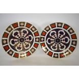 A pair of Royal Crown Derby Imari decorated chargers, pattern 1128, date code XLV111 & XLV11, 35