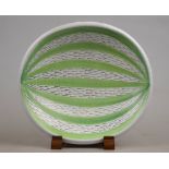 A Stig Lindberg red earthenware shallow bowl decorated with green bands and black dash lines, c.