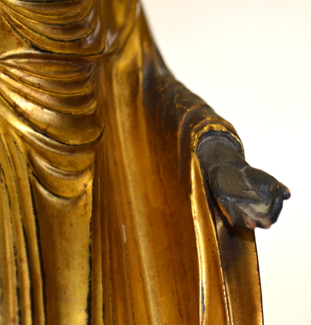 A Japanese 18th century carved wood and gold lacquer figure of a standing Buddha, 37 cm high, on a - Image 4 of 4