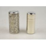 A Victorian silver smelling salts bottle, engraved with scrolling foliage, glass liner with stopper,