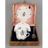 A Royal Doulton nursery rhyme cup and saucer, plate and spoon in original presentation box, c.