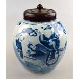 A Chinese early 19th century blue and white ovoid vase decorated with a boy seated on a kylin with