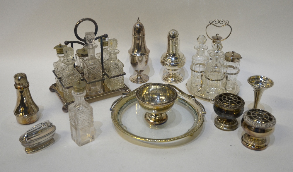 Two cruet sets on electroplated stands,