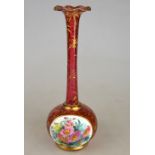 A 19th century Bohemian cranberry glass onion shaped bottle vase with two raised oval panels