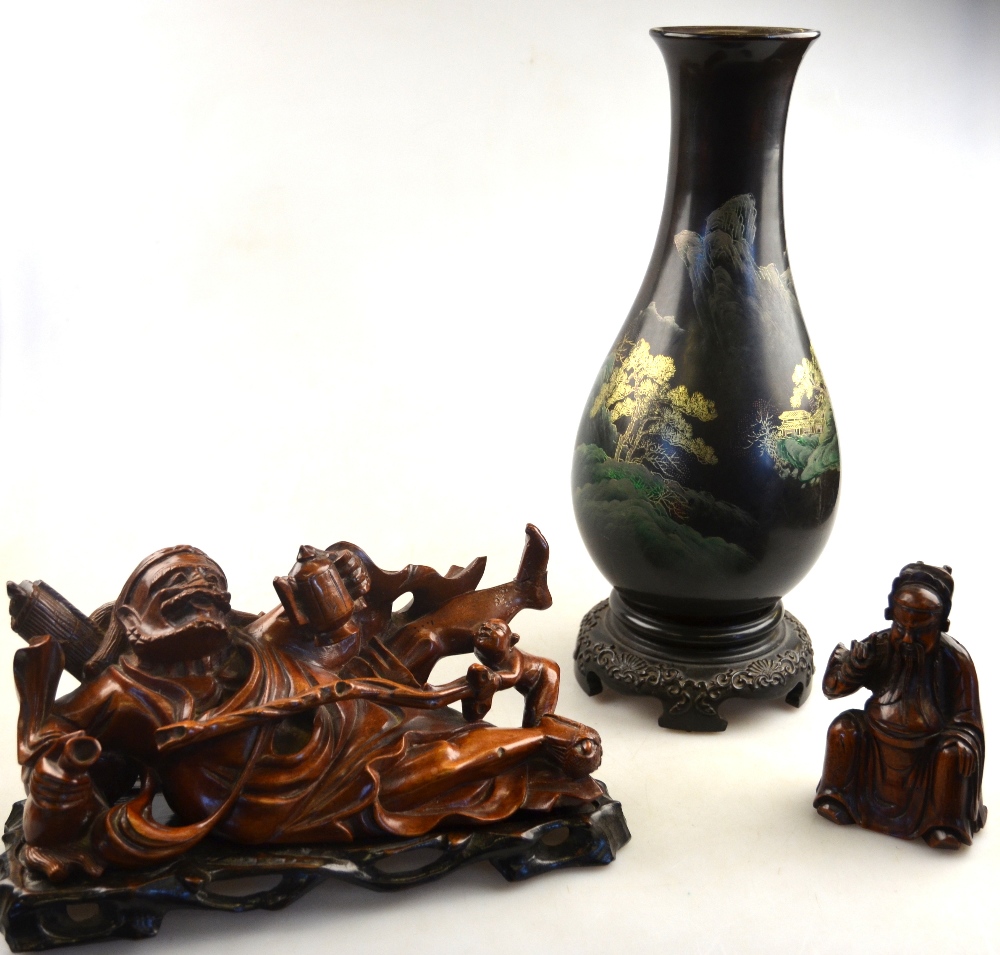 A Chinese 19th century wood carving of a