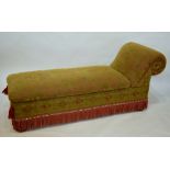 A traditional re-upholstered ottoman cha