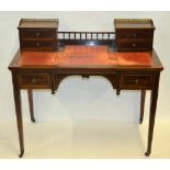 A Victorian inlaid rosewood writing tabl