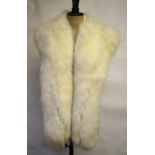 A white fox fur evening stole with cream satin lining Condition Report Good condition.  Few minor