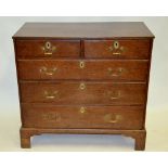 An 18th century oak chest of two short o