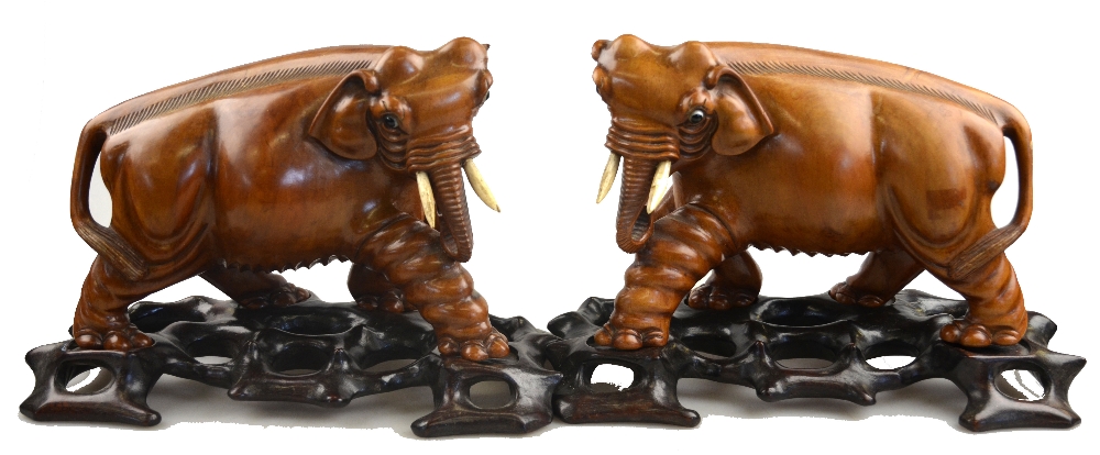 A pair of Chinese carved wood models of