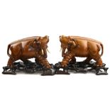 A pair of Chinese carved wood models of