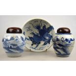 A Chinese 19th century heavily potted porcelain blue and white bowl decorated with a dragon