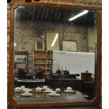 A large burr walnut framed mirror having