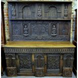An antique 17th century style carved oak