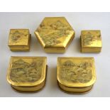 Five Japanese gold lacquered boxes, each