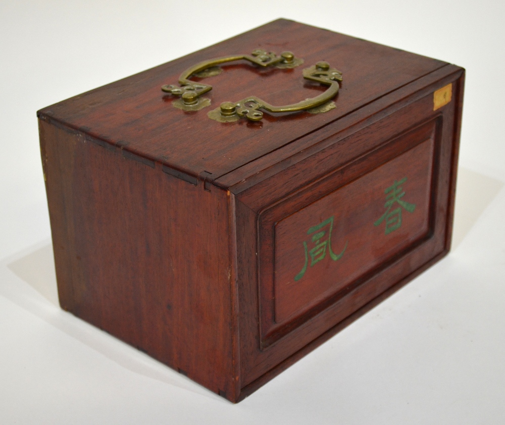 A Chinese Mah Jong set, the hardwood box sliding open to reveal five drawers containing bamboo and - Image 2 of 4