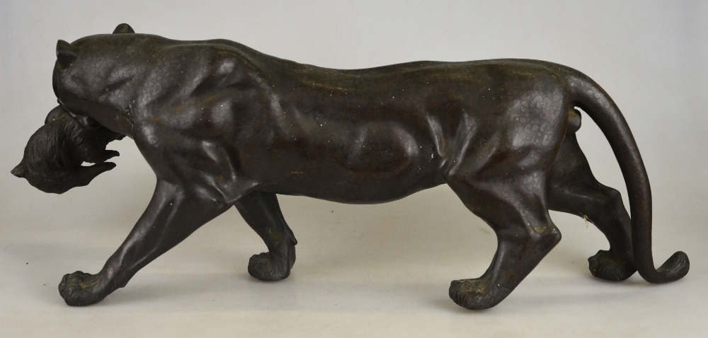 A Japanese bronze model of a leopard with a hare in his mouth, Meiji, seal mark to underside, 47.5 - Image 2 of 3