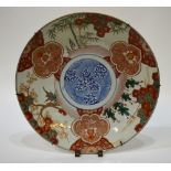 A Japanese Imari charger, Meiji, decorated pine trees, prunus and bamboo, 46.5 cm Condition Report