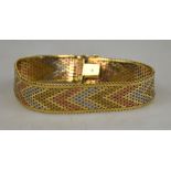 A three-coloured 9ct mesh bracelet with