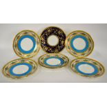 Six Minton dinner plates decorated with a turquoise band and ornate gilding, retailed by Higgins &