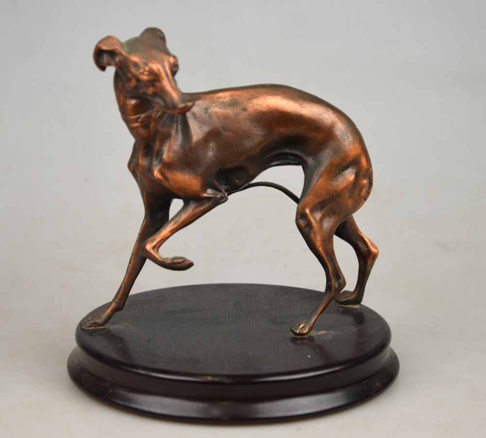 A gilt-patinated bronze figure of a grey