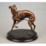 A gilt-patinated bronze figure of a grey