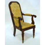 A Regency rosewood framed armchair with