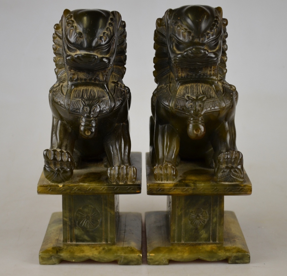 A pair of Chinese carved soapstone seate